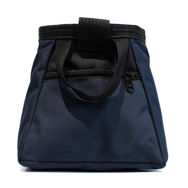 A navy blue and black bouldering chalk bucket with drawstring closure and zip closure climbing accessory pockets