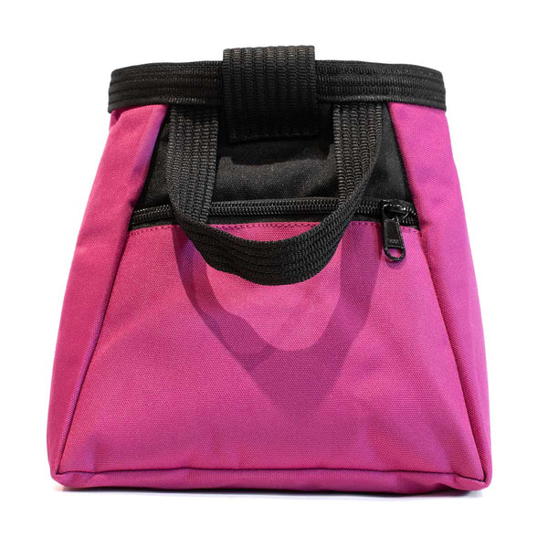 A magenta and black bouldering chalk bucket with drawstring closure and zip closure climbing accessory pockets