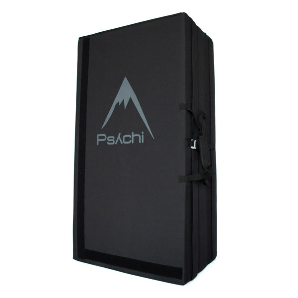 A black psychi bouldering crash pad dual layer triple fold 