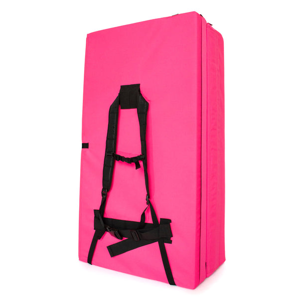 A pink psychi bouldering crash pad dual layer triple fold 