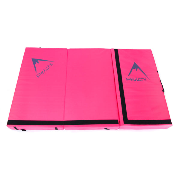 A pink psychi bouldering crash pad dual layer triple fold 