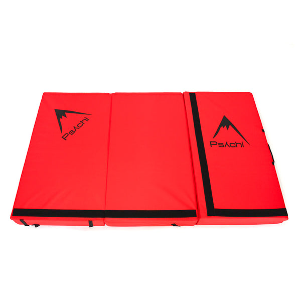 A red psychi bouldering crash pad dual layer triple fold 