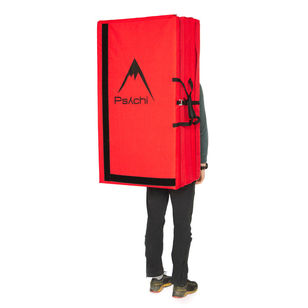 A red psychi bouldering crash pad dual layer triple fold 