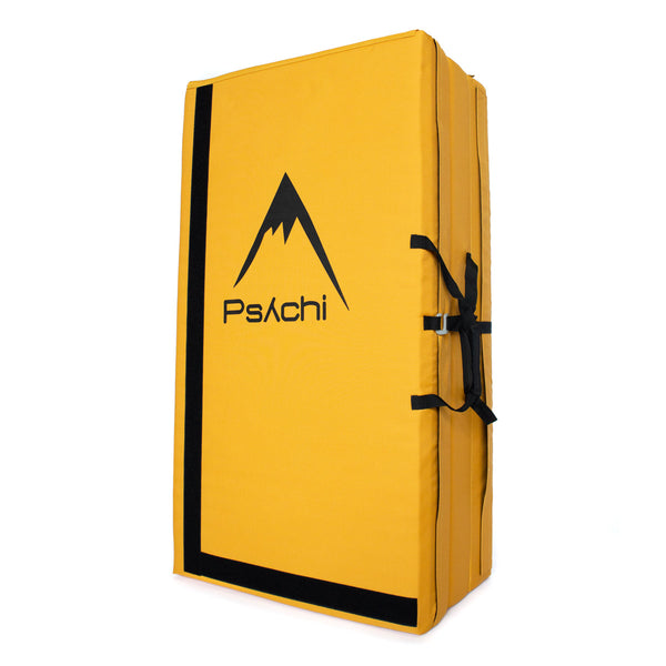 A yellow psychi bouldering crash pad dual layer triple fold 