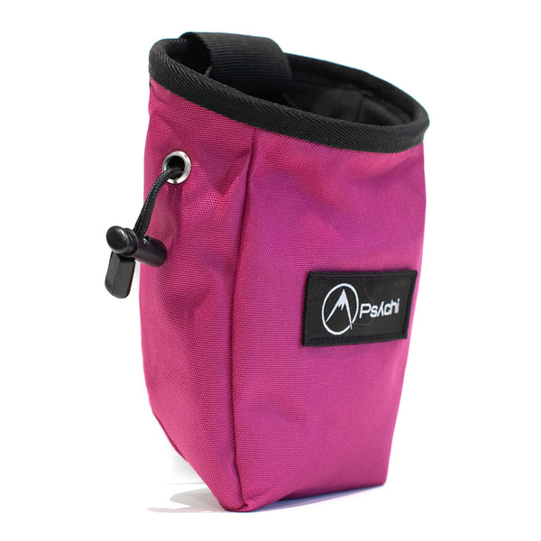 A magenta rock climbing chalk bag with drawstring closure and Pyschi white mountain logo on a black fabric patch