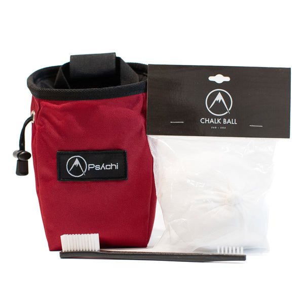 A red climbing chalk bag with a 56g chalk ball and plastic double ended brush