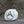 A rock climbing chalk ball sitting on a gritstone rock in the peak district