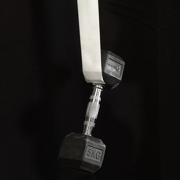 A length of strong cotton zinc oxide climbing tape suspending a 5kg dumbell in the air